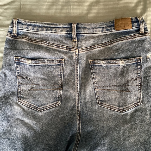 Slightly distressed light-wash mom jeans from American Eagle size 16. - Picture 4 of 5